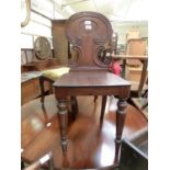 A 19th century mahogany hall chair