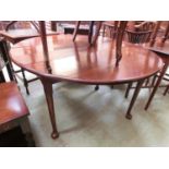 An 18th century mahogany drop-leaf table with pad feet