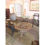 A green painted metalwork rusted garden table with single chair - a lonely bistro set