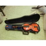 A child's violin in case