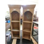 A pair of pine bookshelves