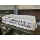 An enamelled advertising dish for Palethorpe's Royal Cambridge Sausages