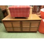 A mid-20th century teak two door cupboard