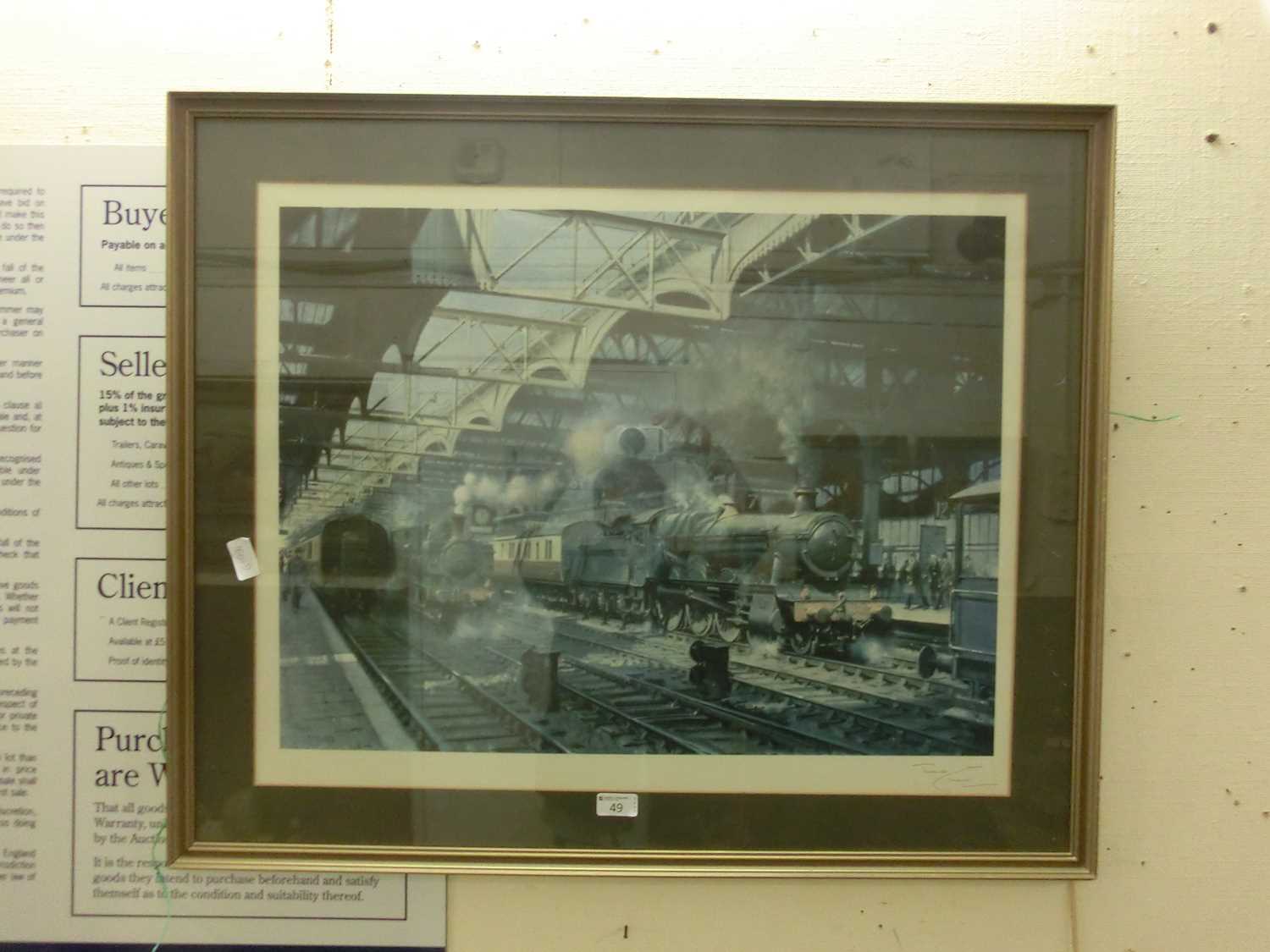 A framed and glazed Cuneo print of steam locomotives with blind stamp