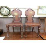 A pair of Victorian mahogany shield back chairs