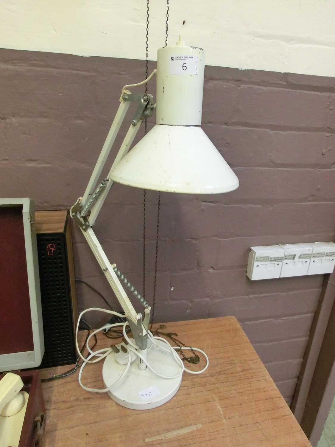 A white angle poise style lamp