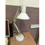 A white angle poise style lamp