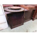 An early 20th century two door cupboard