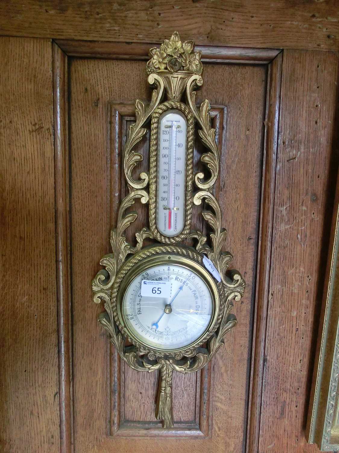An ornate gilt wood banjo barometer (A/F)