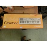 A boxed Casio MT-45 keyboard
