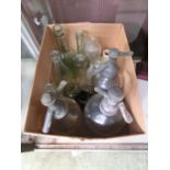 A carton containing three soda siphons, including two from Leamington Spa and other old glass