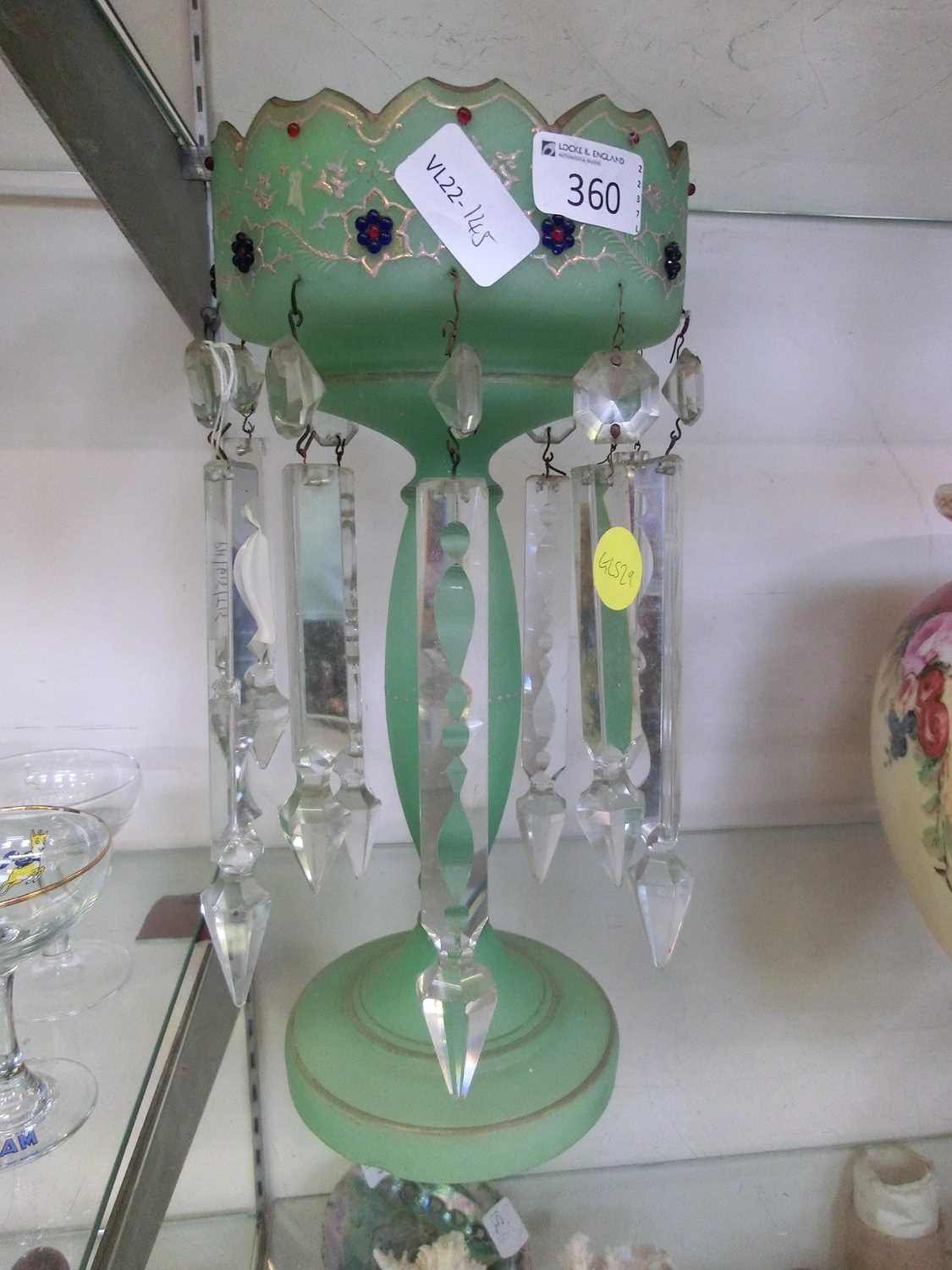 A Victorian green glass lustre