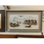 A mid-20th century framed oil of eastern boating scene signed bottom right