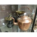 A copper kettle together with a set of black painted and brass scales