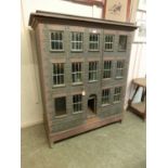 A large early 20th century doll's house in the form of a Georgian buildingDimensions: H: 150cmW: