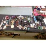 A tray containing a quantity of costume jewellery