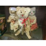 Three clockwork teddy bears