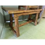 A hand crafted stained pine occasional table