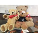 A Merrythought teddy bear together with a 2014 Harrods teddy bear and a Steiff teddy bear with