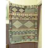 An eastern woollen woven rug