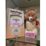 A 1980s Teddy Ruxpin with associated cassette tapes