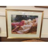 A modern framed and glazed print of lounging lady