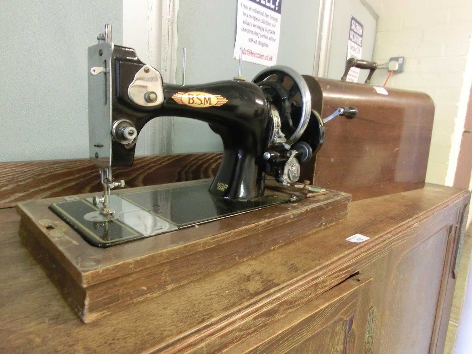 A cased BSM manual sewing machine