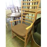 A rail back beech rocking chair