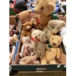 A tray of early 20th century teddy bears