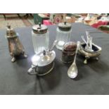 An assortment of white metal and plated ware to include salts, spoons, pots, etc