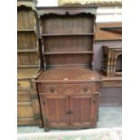 A reproduction oak dresser