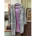 A lady's tiger print jacket by Allen B