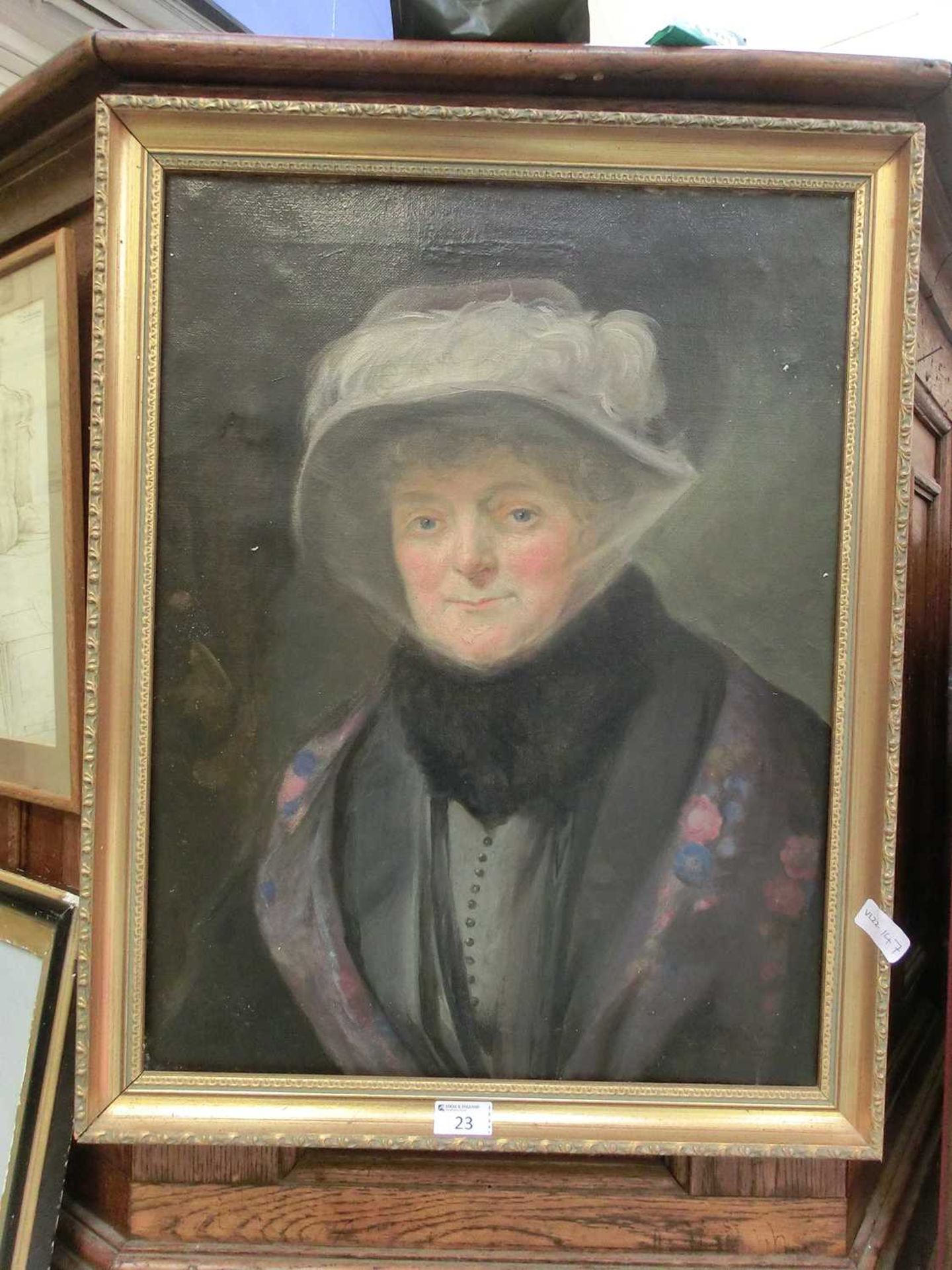 An early 20th century oil on canvas of elderly lady
