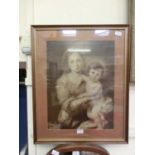A framed and glazed monochrome print of Madonna and child