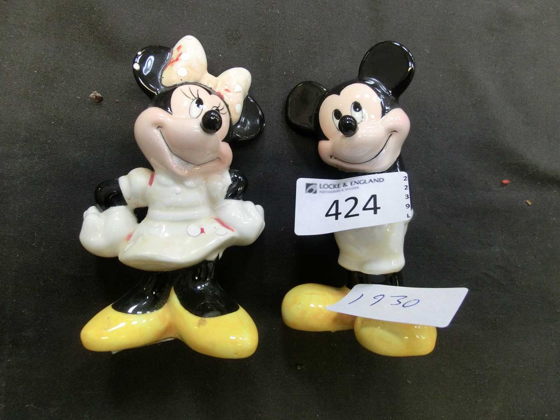 Two ceramic models of Mickey and Minnie Mouse