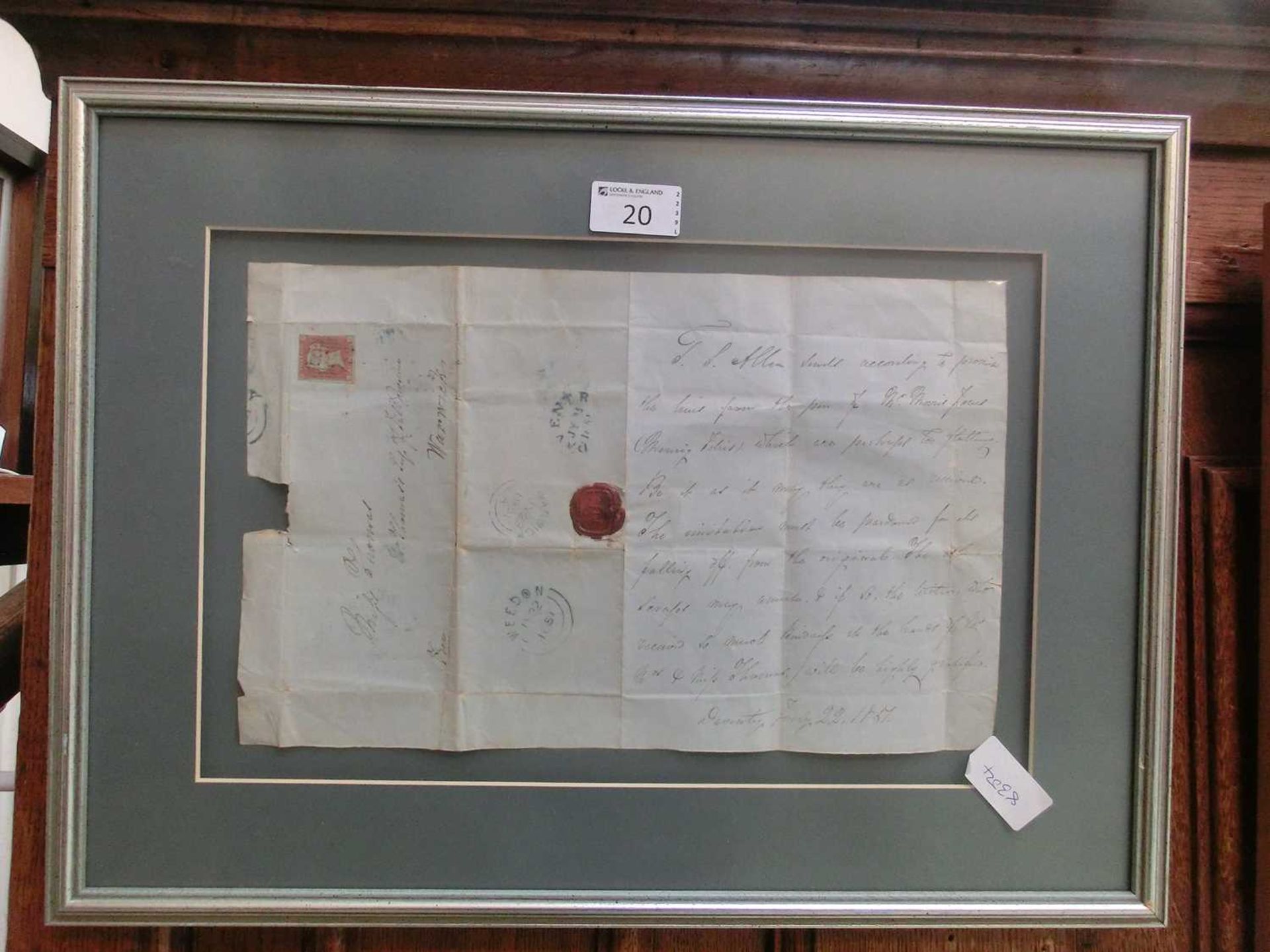 A framed and glazed 19th century letter with penny red stamp dated 1851