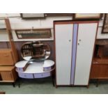 A mid-20th century Formica topped dressing table with purple painted drawers together with a similar