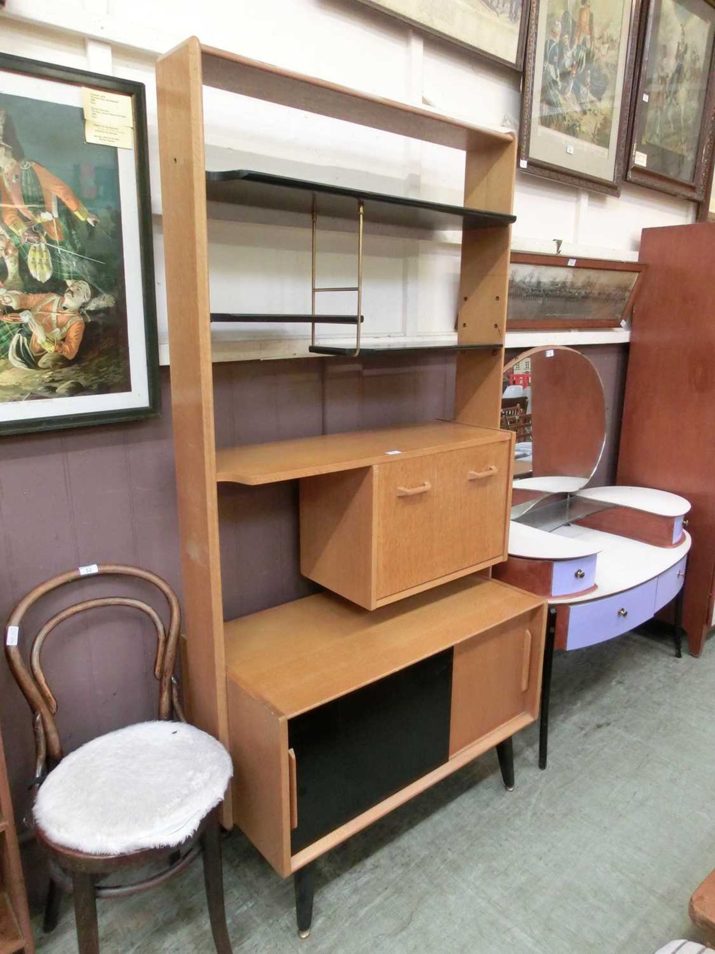 A mid-20th century design oak wall divider