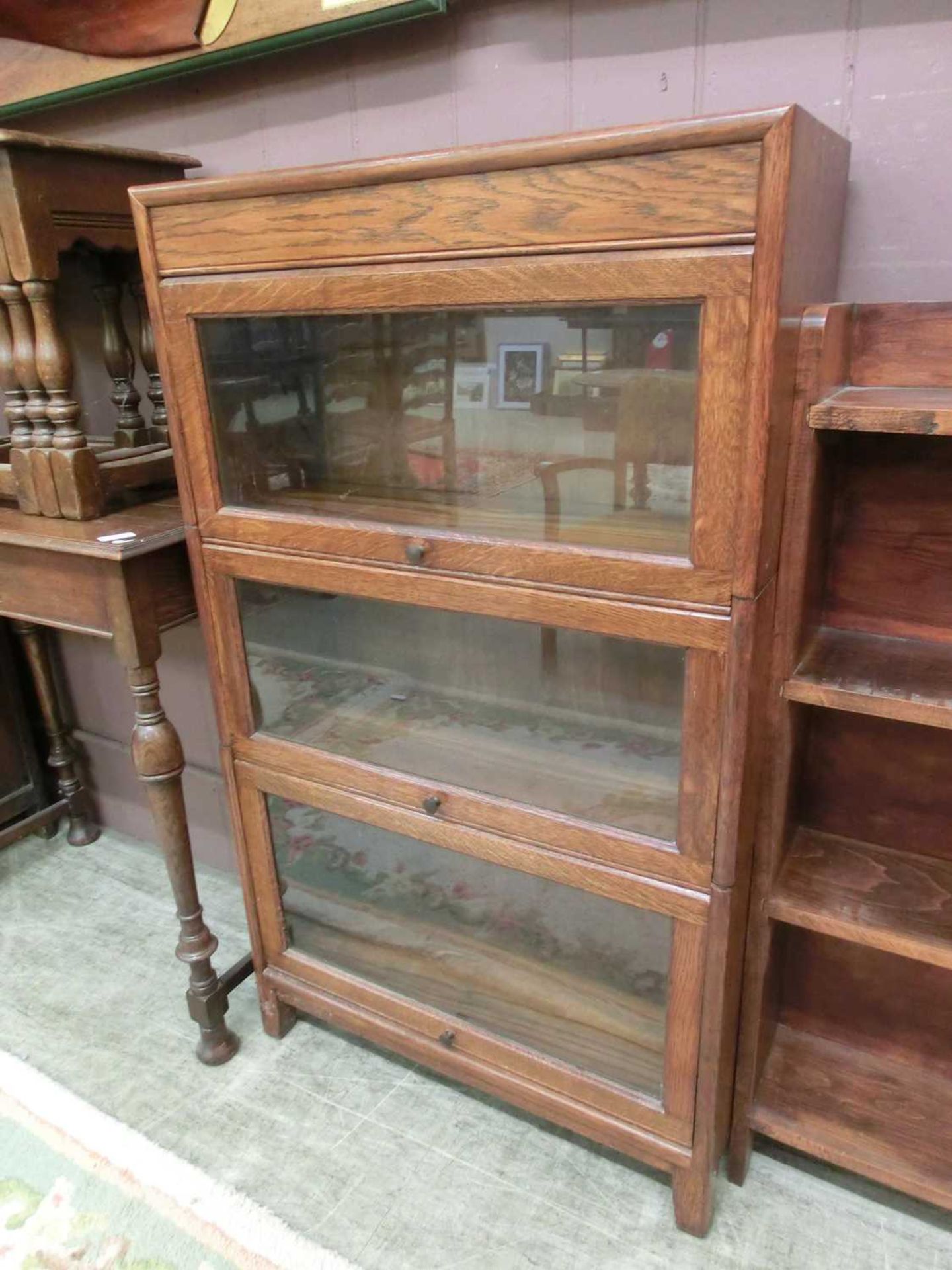 An early 20th century oak sectional bookcase