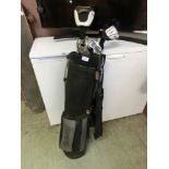 A golf bag with a selection of golf clubs