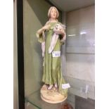 A Royal Dux figurine of young lady (A/F)