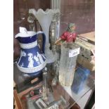 A blue and white Jasperware jug together with a lustre vase, a ceramic figure, and a glass beaker