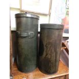 Two leather cylindrical boxes