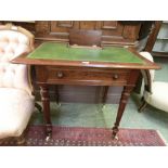 A 19th century mahogany writing table, lift up stationery section to top with a tooled green leather