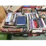 Four trays of modern hardback books on various subjects to include militaria