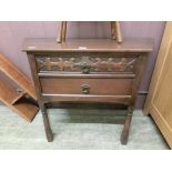 A mid-20th century oak two drawer cabinet