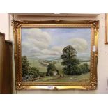 A gilt framed oil on canvas of countryside scene