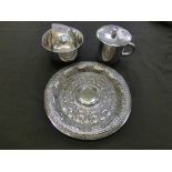 Three white metal eastern items to include an embossed tray and one other
