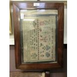 A 19th century rosewood framed sampler by Eliza Mills dated 1870