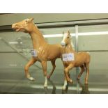 Two Beswick horses